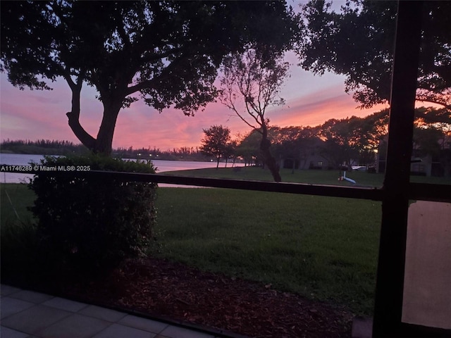 view of yard with a water view