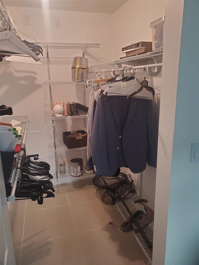 117 NW 42nd Ave Unit 507, Miami, FL 33126 - walk in closet featuring tile patterned flooring