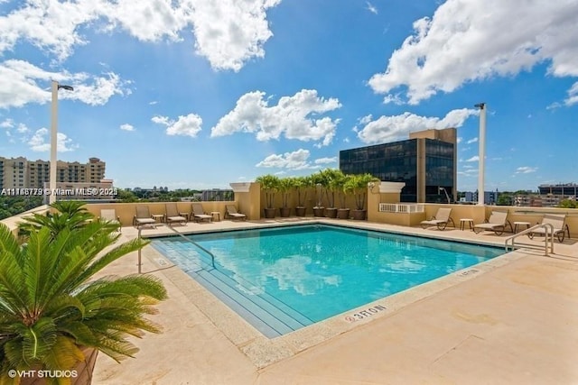 117 NW 42nd Ave Unit 507, Miami, FL 33126 - view of pool with a patio area