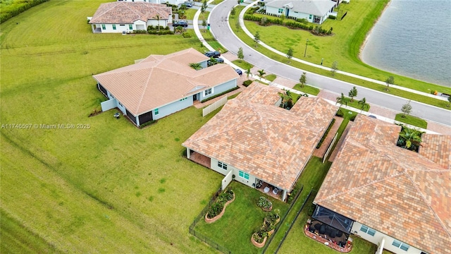 drone / aerial view featuring a water view