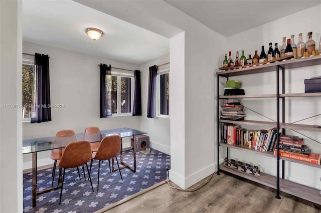 4711 NW 11th Ave, Miami, FL 33127 - dining space with baseboards and wood finished floors