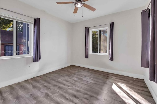 4711 NW 11th Ave, Miami, FL 33127 - spare room with baseboards, wood finished floors, and ceiling fan