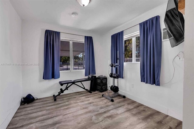 4711 NW 11th Ave, Miami, FL 33127 - workout room featuring wood finished floors