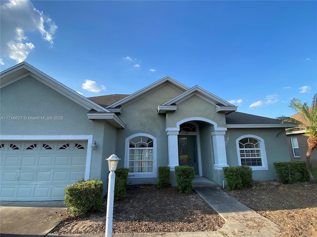 view of front of property featuring a garage