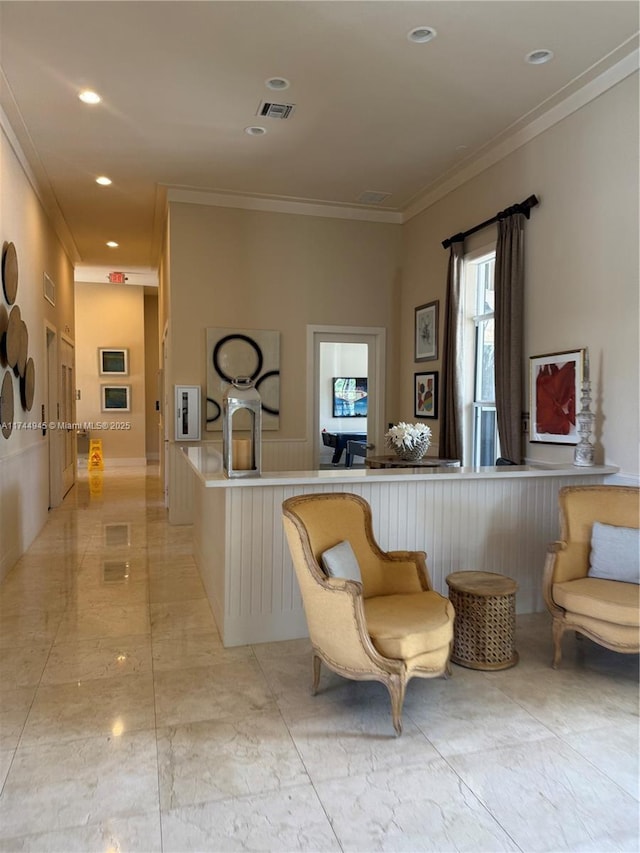 living area featuring marble finish floor, visible vents, crown molding, and recessed lighting