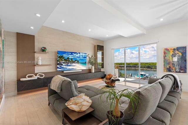 350 Desoto St, Hollywood, FL 33019 - living room featuring beam ceiling and light wood-type flooring