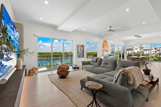350 Desoto St, Hollywood, FL 33019 - living room featuring a water view, ceiling fan, and light hardwood / wood-style flooring