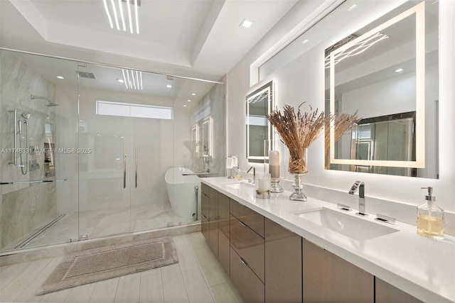 350 Desoto St, Hollywood, FL 33019 - bathroom featuring vanity and independent shower and bath