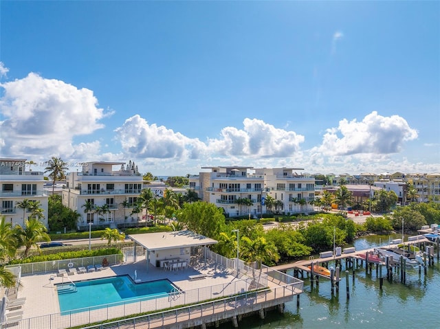 350 Desoto St, Hollywood, FL 33019 - exterior space featuring a water view, a community pool, and a patio area