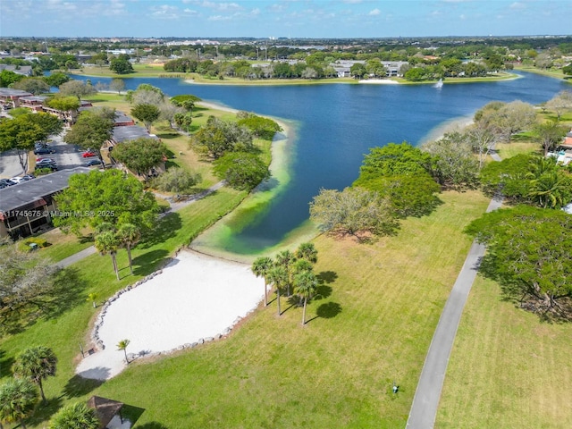 drone / aerial view with a water view