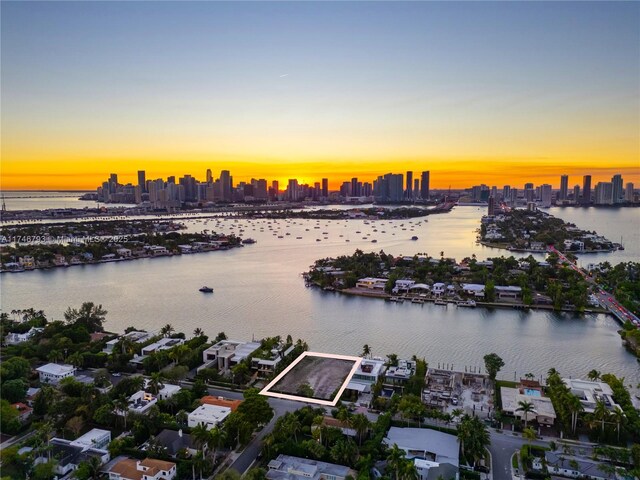 228302 W Dilido Dr, Miami Beach, FL 33139 - aerial view at dusk of a water view and a skyline view
