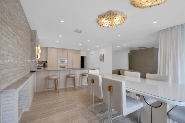 dining room featuring visible vents and recessed lighting