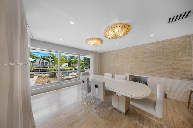 dining space with visible vents and recessed lighting