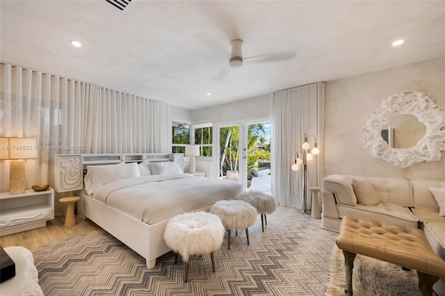 bedroom featuring recessed lighting, a ceiling fan, and access to exterior