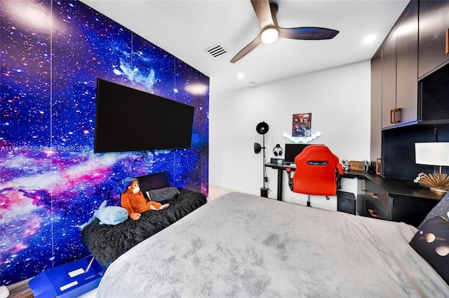 bedroom featuring a ceiling fan and visible vents