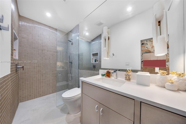 full bathroom with recessed lighting, toilet, a shower stall, vanity, and tile patterned flooring