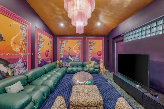 carpeted cinema with recessed lighting, vaulted ceiling, and an inviting chandelier