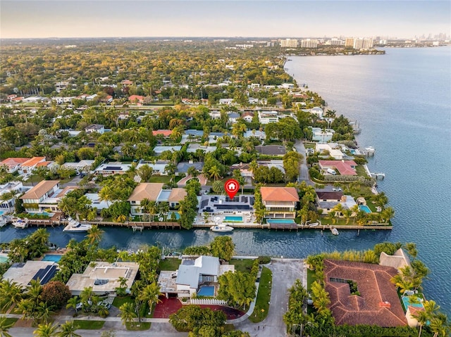 aerial view featuring a residential view and a water view