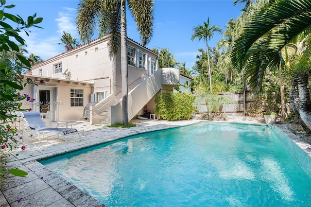 view of pool featuring pool water feature