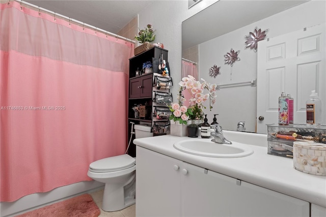 full bathroom with toilet, tile patterned flooring, shower / tub combo with curtain, and vanity