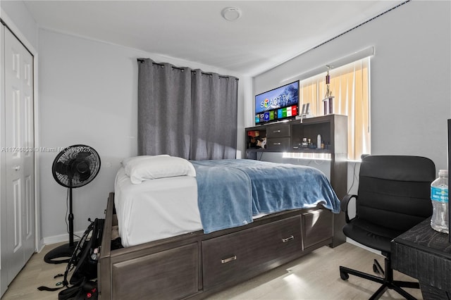 bedroom featuring wood finished floors