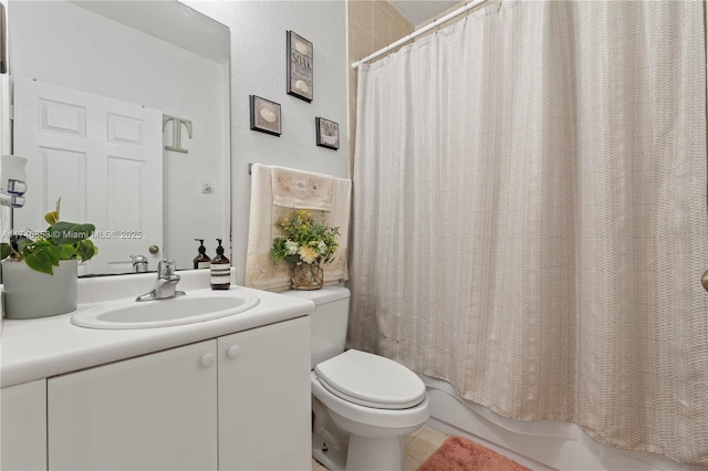 bathroom with tile patterned flooring, vanity, toilet, and shower / bathtub combination with curtain