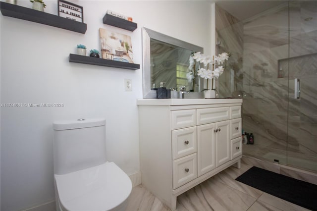 bathroom with toilet, a marble finish shower, and vanity