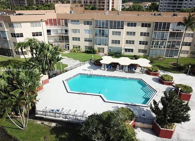 view of swimming pool featuring a patio