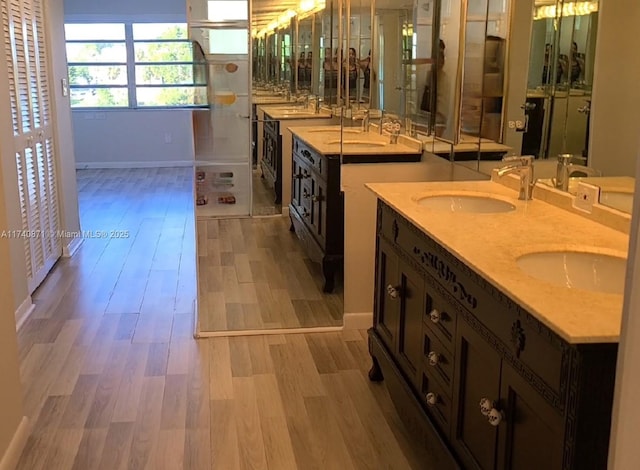 bathroom featuring hardwood / wood-style flooring and sink