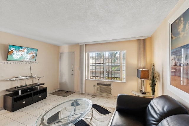 living room with light tile patterned floors, a textured ceiling, and a wall mounted AC