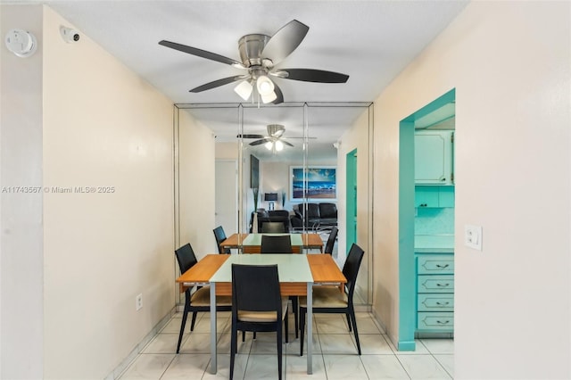 dining space featuring ceiling fan