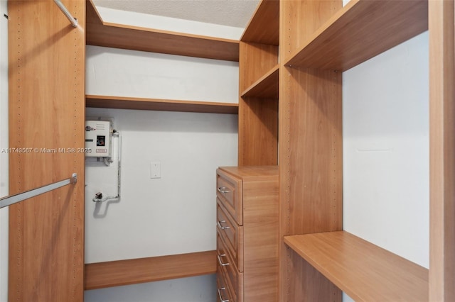 walk in closet with water heater