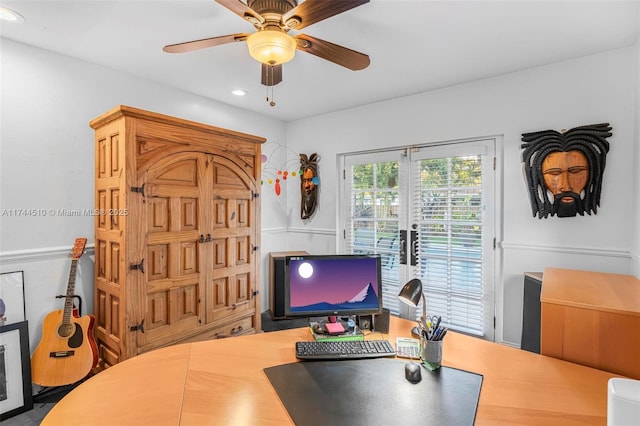 home office featuring french doors and ceiling fan