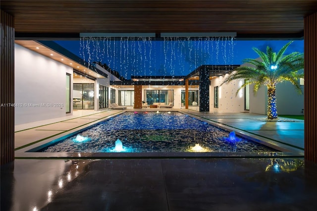 view of swimming pool featuring a patio