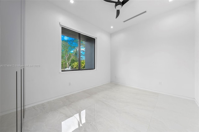 unfurnished room featuring ceiling fan