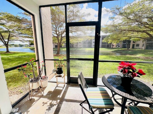 10332 Sunrise Lakes Blvd Unit 103, Sunrise, FL 33322 - sunroom with a water view