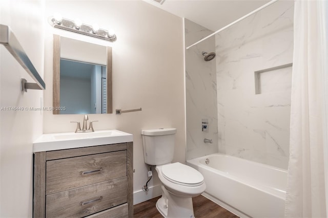 full bathroom with hardwood / wood-style flooring, vanity, toilet, and shower / bath combo