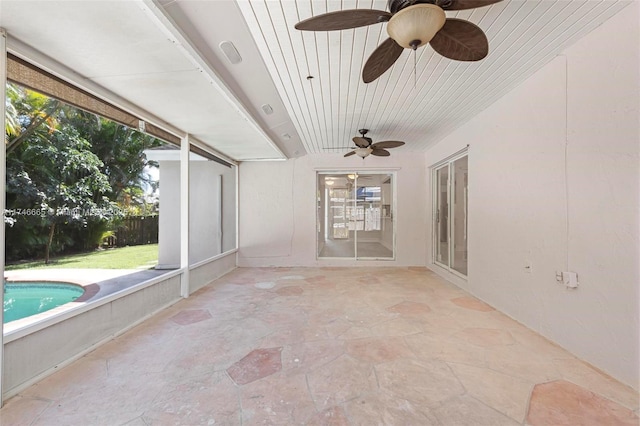 interior space featuring ceiling fan