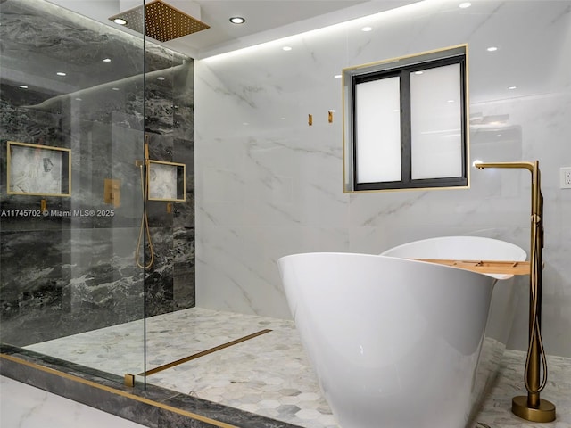 full bath featuring recessed lighting, a soaking tub, tile walls, and a marble finish shower