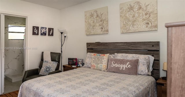 bedroom with wood finished floors