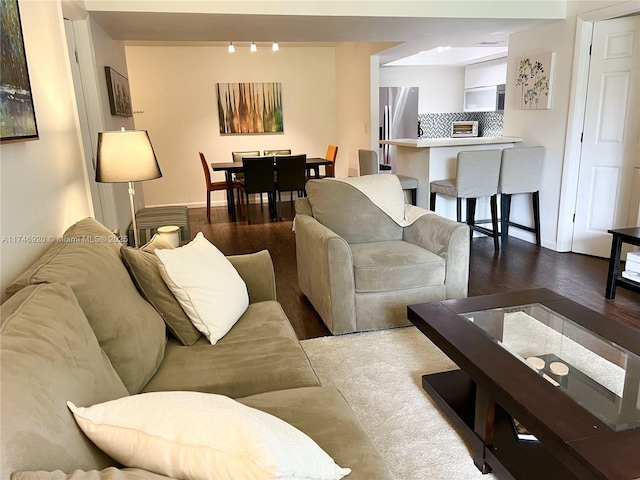 living room featuring dark hardwood / wood-style flooring