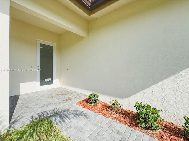 312 SE Via Sangro Prt, St Lucie, FL 34952 - entrance to property featuring stucco siding