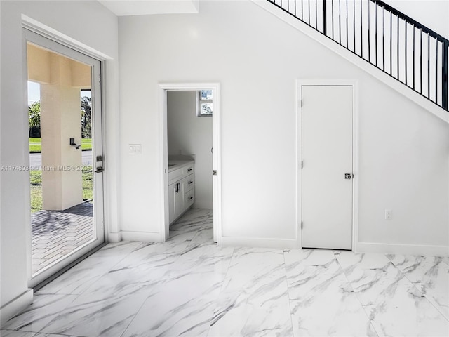 312 SE Via Sangro Prt, St Lucie, FL 34952 - interior space with light marble finish flooring and baseboards