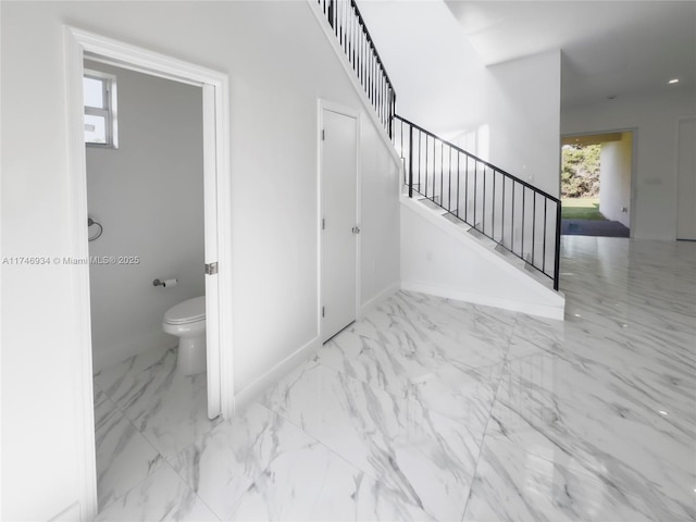 312 SE Via Sangro Prt, St Lucie, FL 34952 - bathroom featuring toilet and marble finish floors