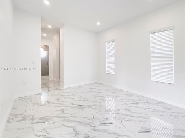 312 SE Via Sangro Prt, St Lucie, FL 34952 - spare room featuring recessed lighting and light marble finish floors