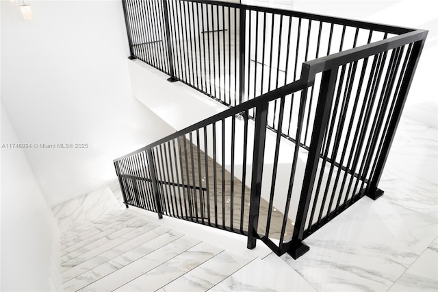 312 SE Via Sangro Prt, St Lucie, FL 34952 - stairs with marble finish floors and a high ceiling