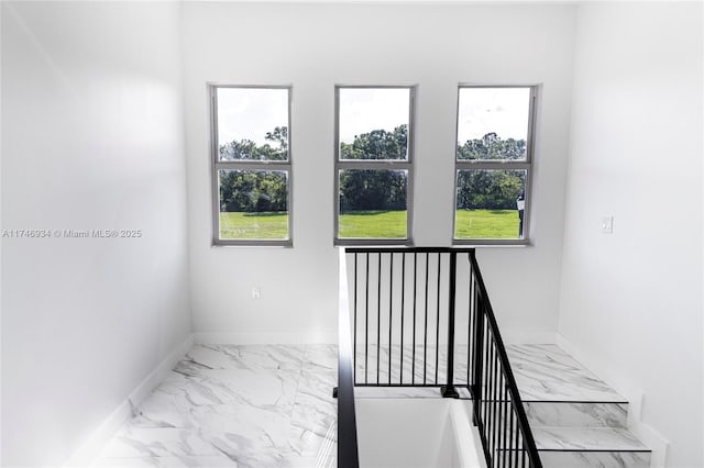 312 SE Via Sangro Prt, St Lucie, FL 34952 - stairs with marble finish floors and plenty of natural light