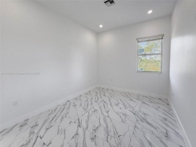 312 SE Via Sangro Prt, St Lucie, FL 34952 - unfurnished room featuring recessed lighting and marble look tile flooring