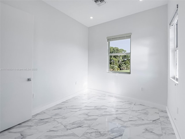 312 SE Via Sangro Prt, St Lucie, FL 34952 - unfurnished room with recessed lighting and light marble finish flooring