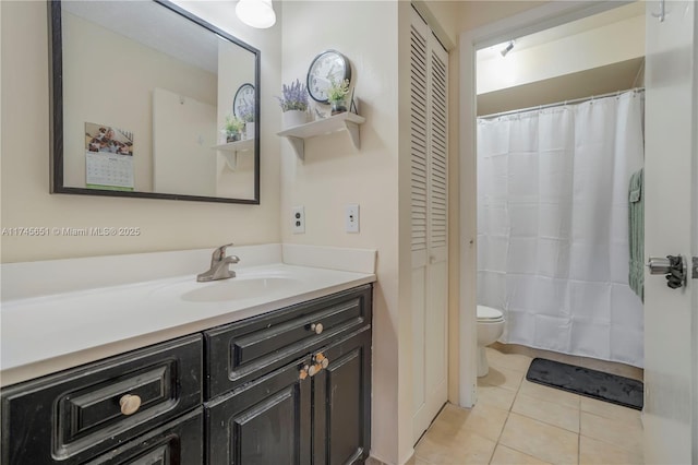 full bathroom featuring toilet, a shower with curtain, tile patterned flooring, vanity, and a closet